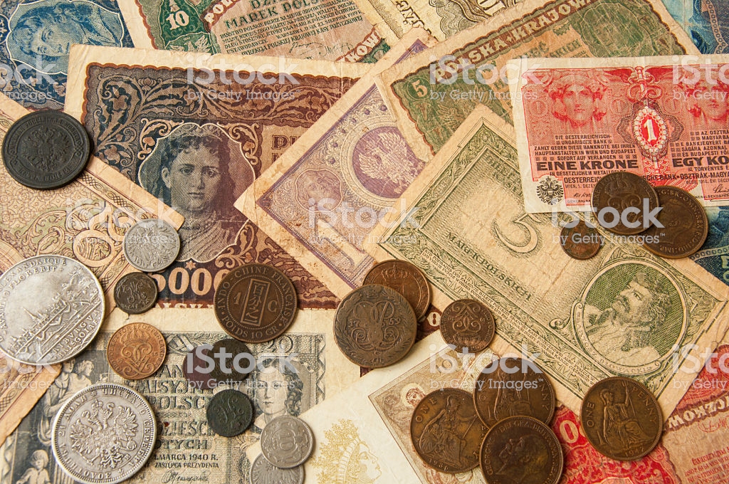 old banknotes with antic silver and copper coinsvintage background, wallpaper